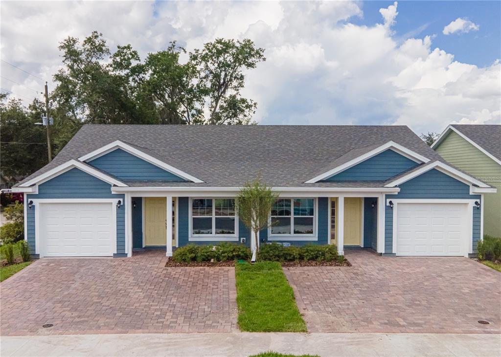 front view of a house with a yard