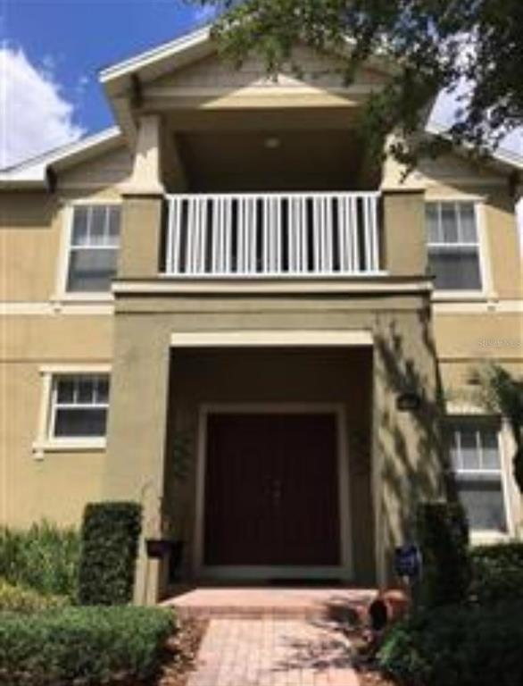 a view of a house with a balcony