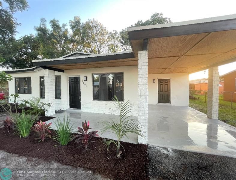 a view of a house with a patio