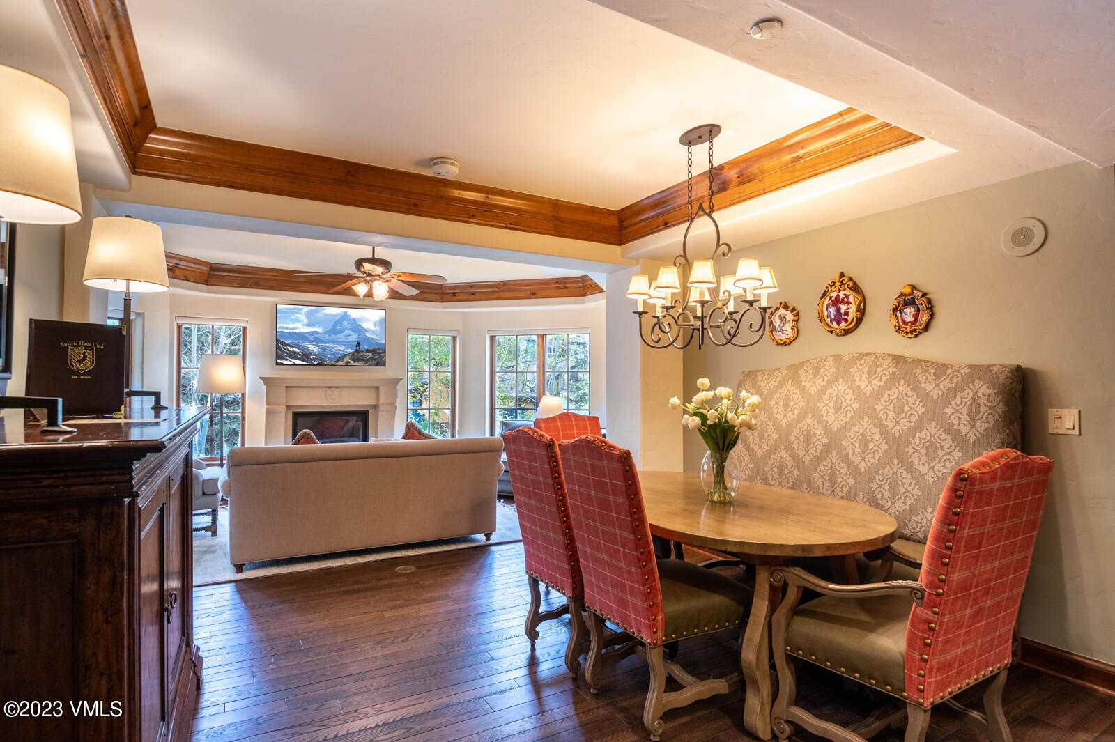 a view of a dining room with furniture and wooden floor