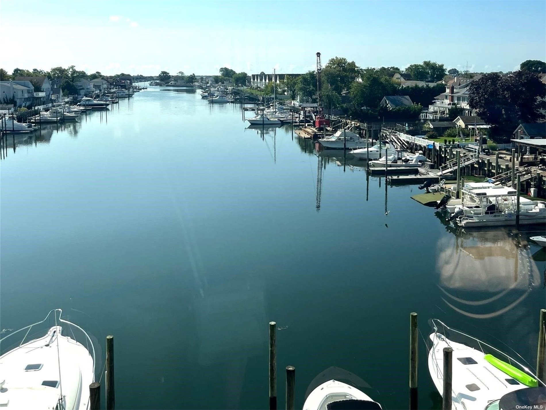 a view of a lake with boats