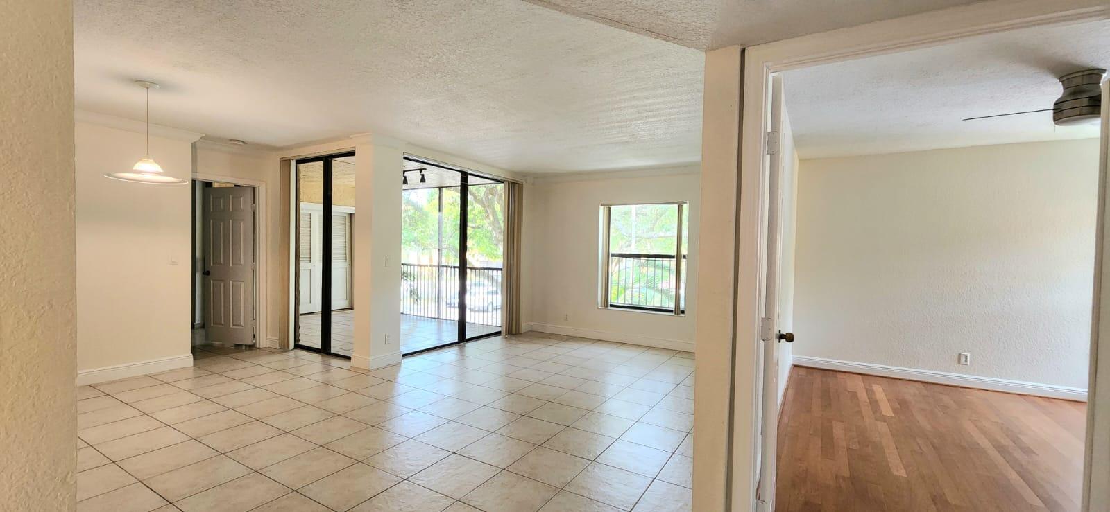 a view of an empty room and window