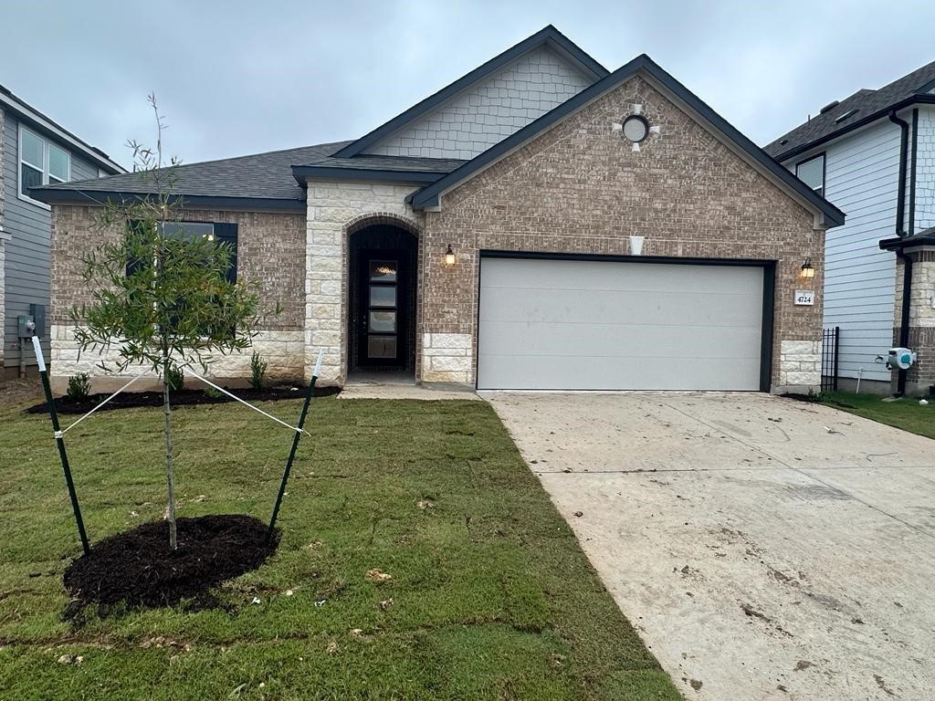 a house view with a garden space