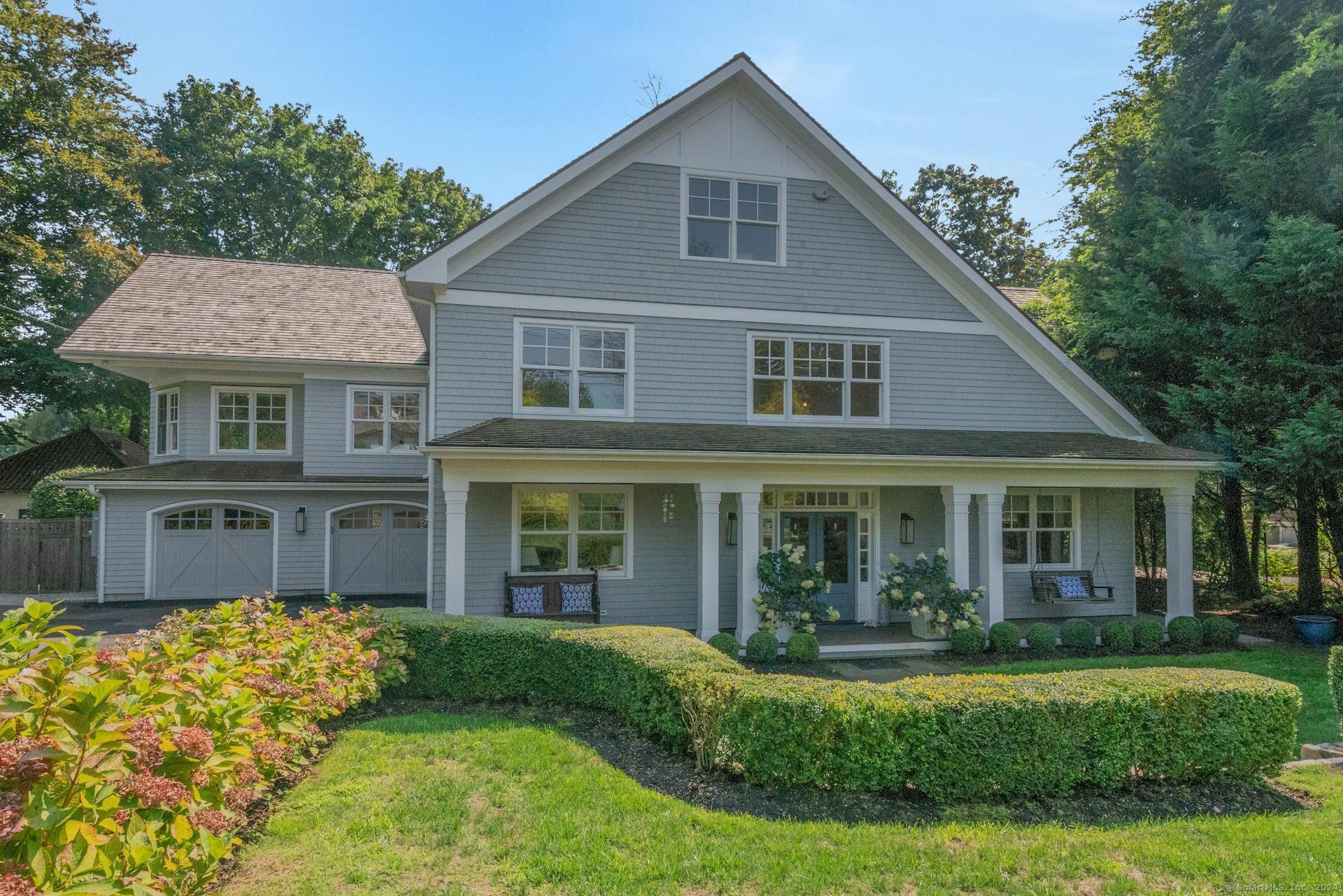 Front of house with wood shingle roof