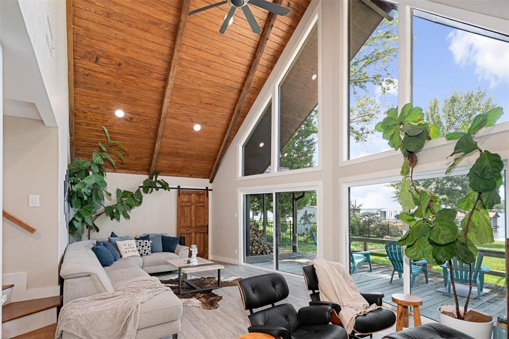 a lobby with furniture and potted plant