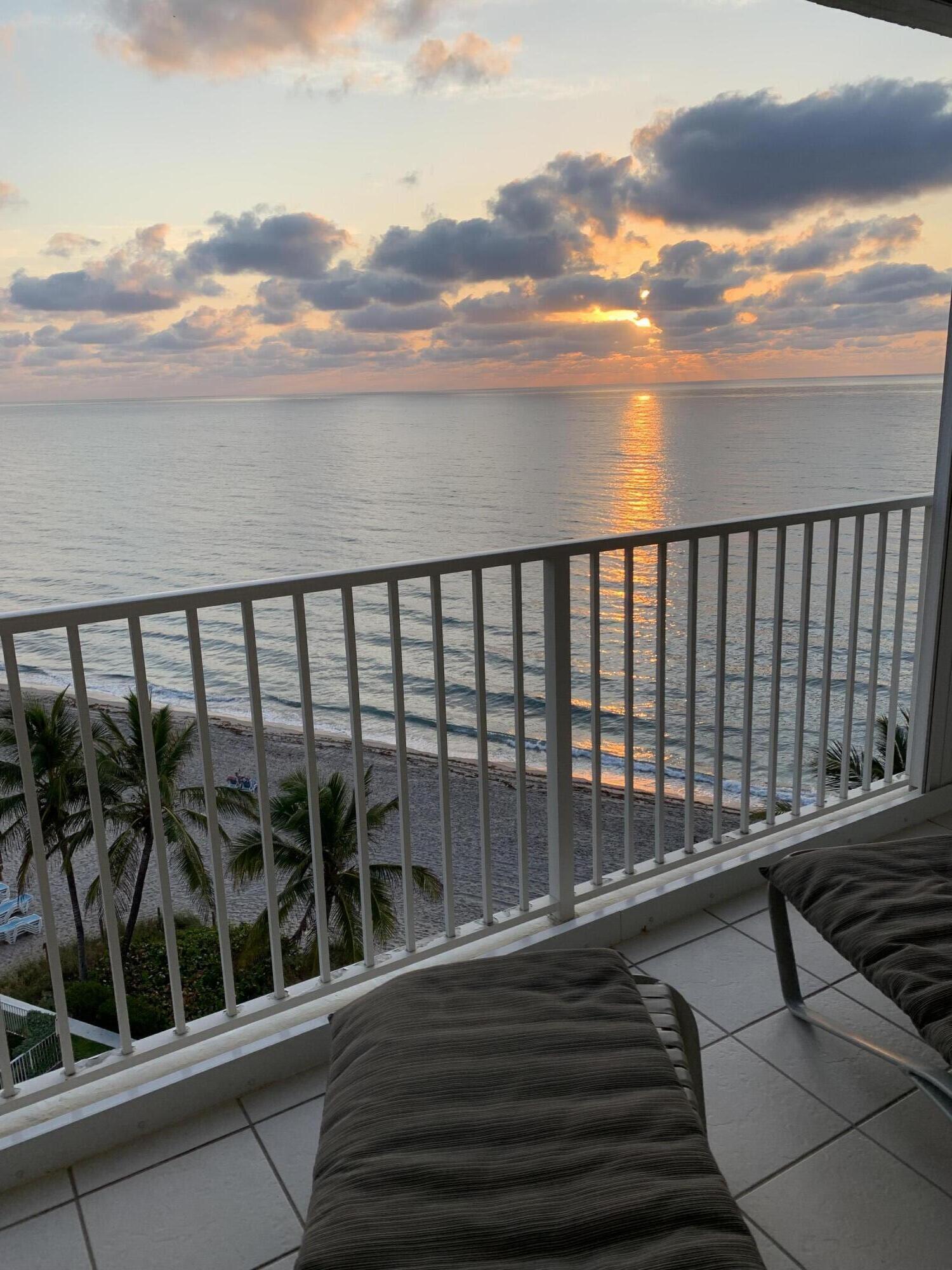 a view of balcony with furniture