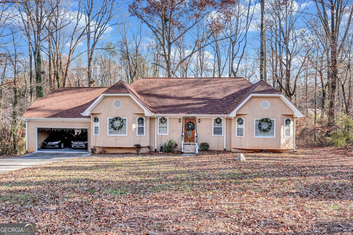 a front view of a house with a yard