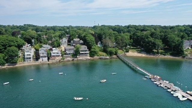 a view of a lake with a yard