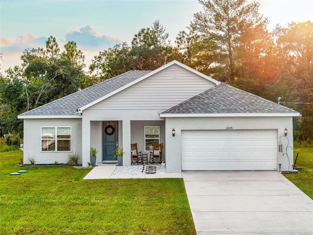 a view of a house with patio