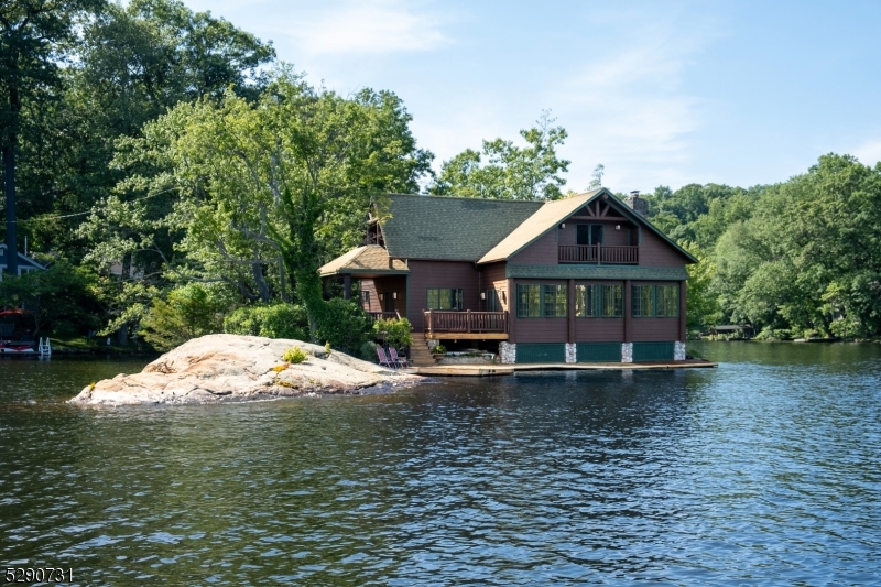 a house with trees in the background