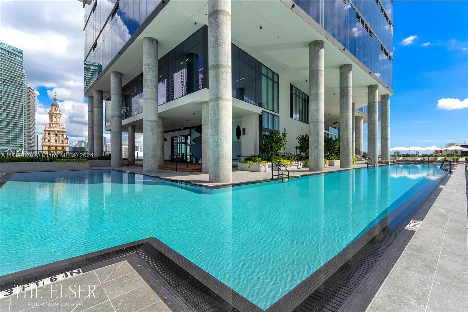 a view of a swimming pool with a patio