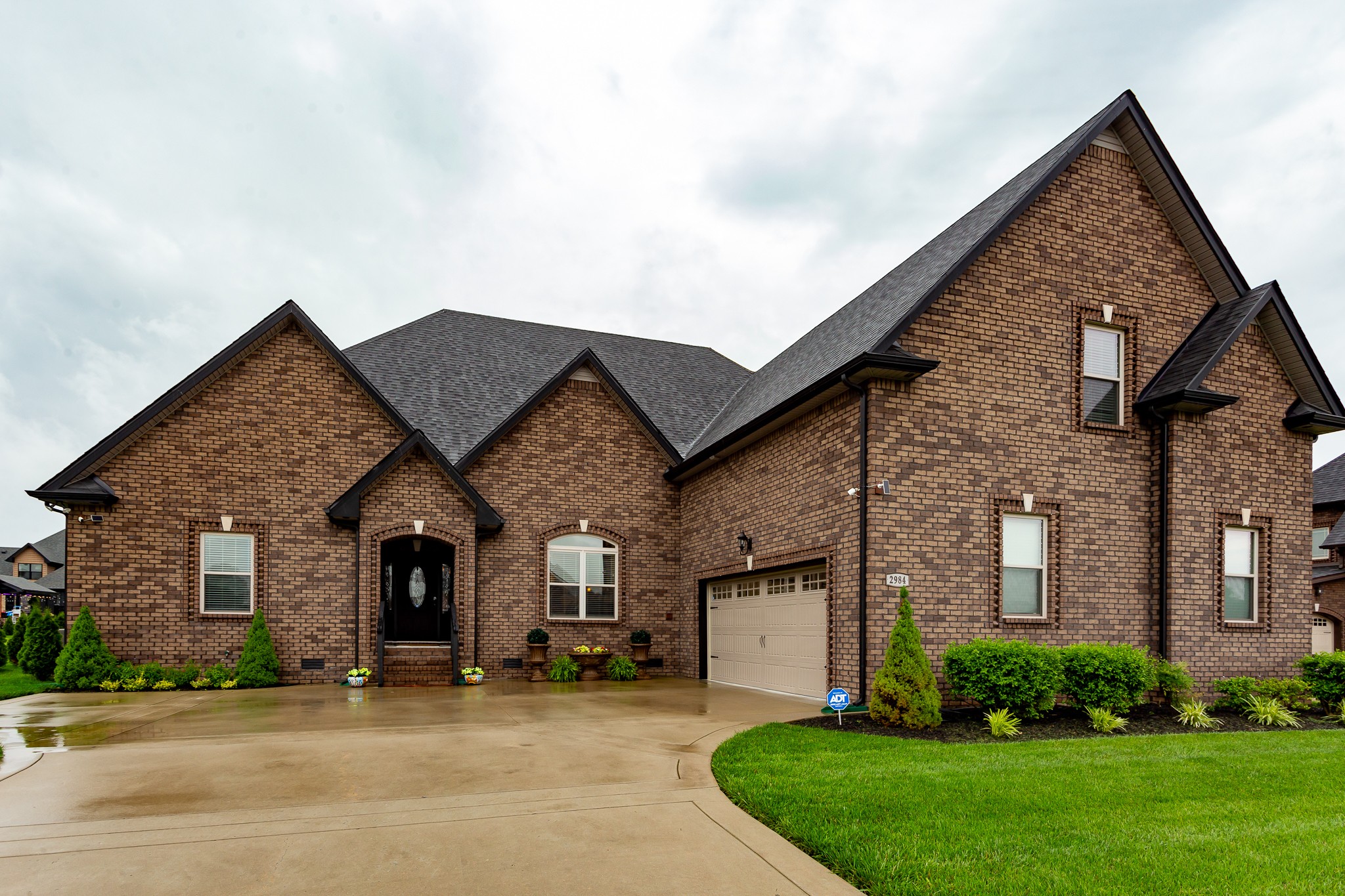 front view of a house with a yard