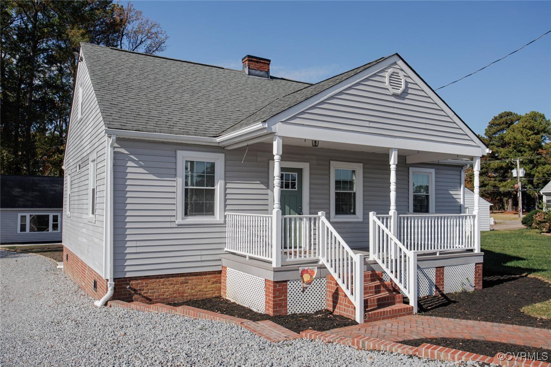 Bungalow-style house with covered porch