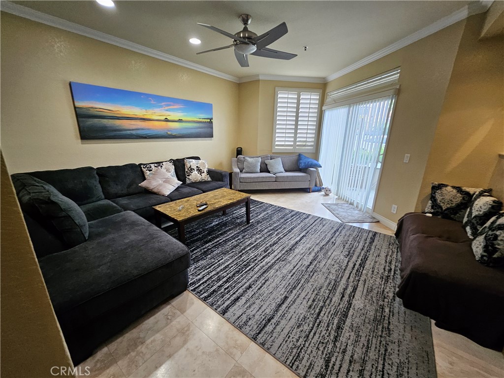 a living room with furniture and a window