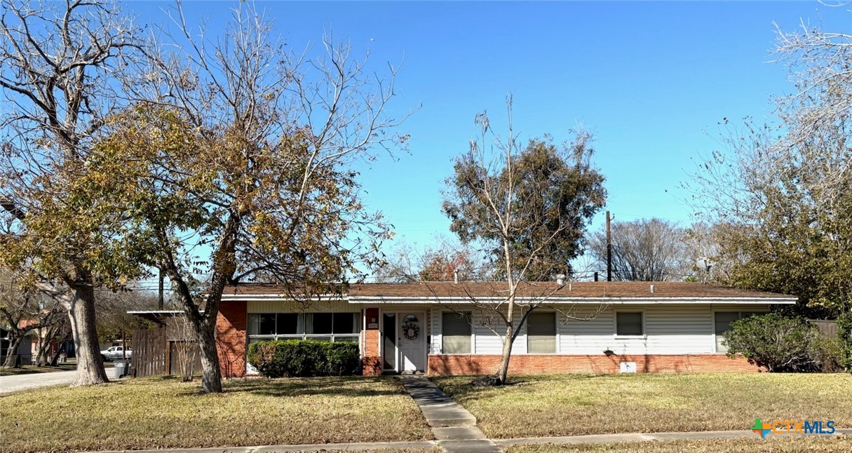 front view of a house with a patio