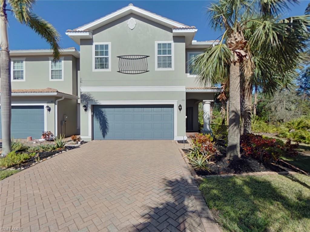 View of front of property with a garage