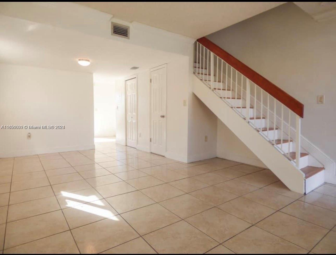 a view of an entryway with staircase