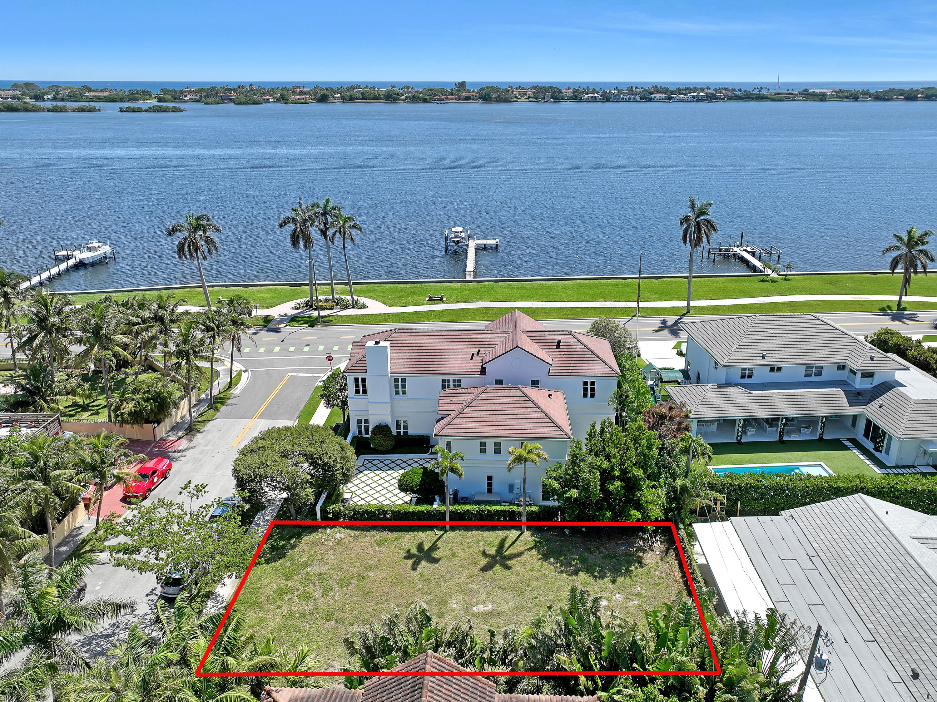 an aerial view of a house with a swimming pool and outdoor space