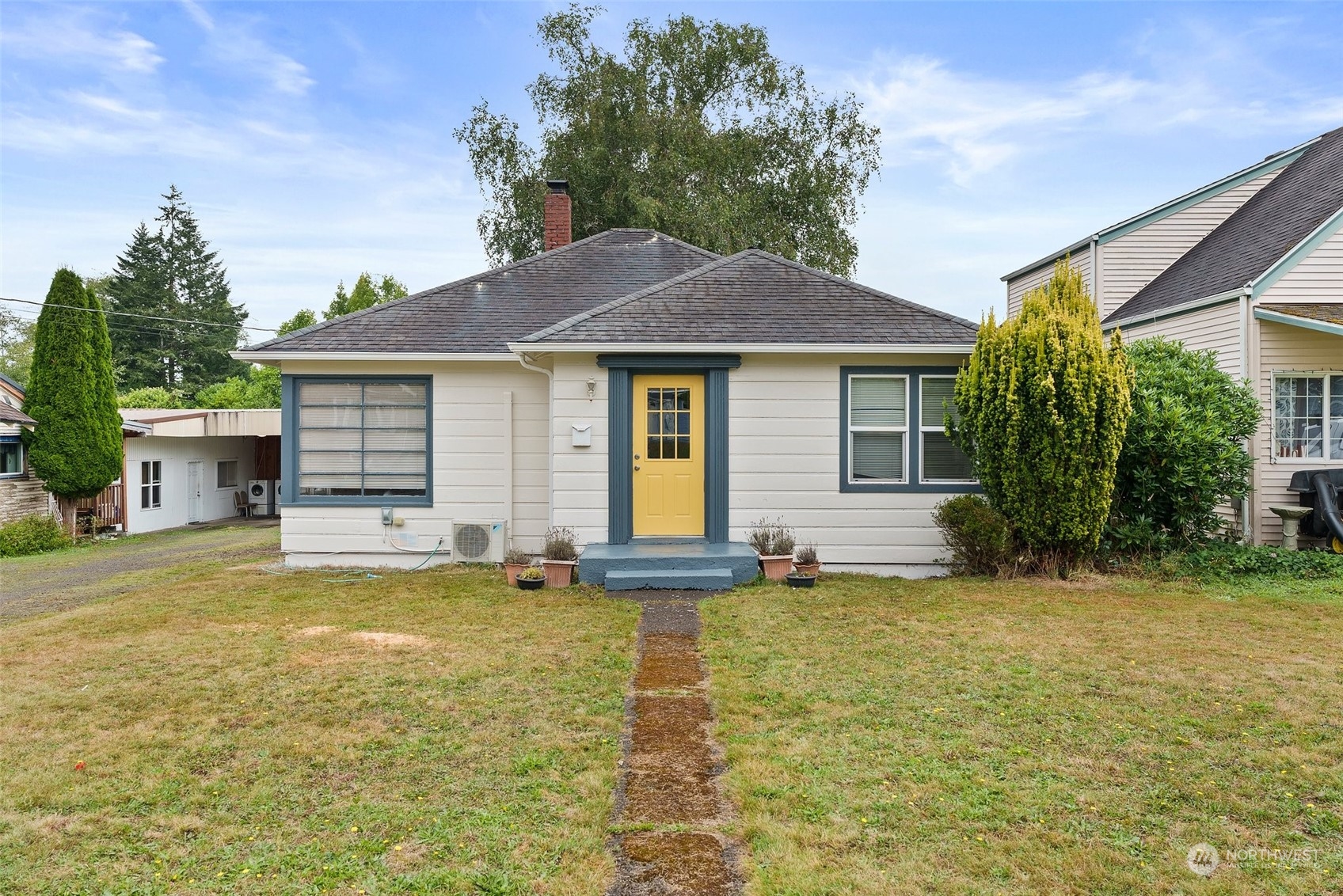 a house view with a garden space