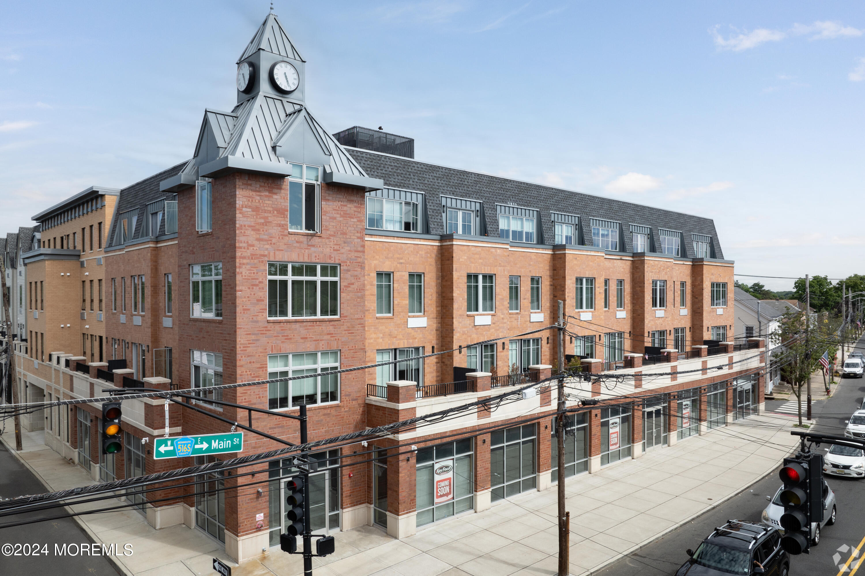 a front view of a building with many windows