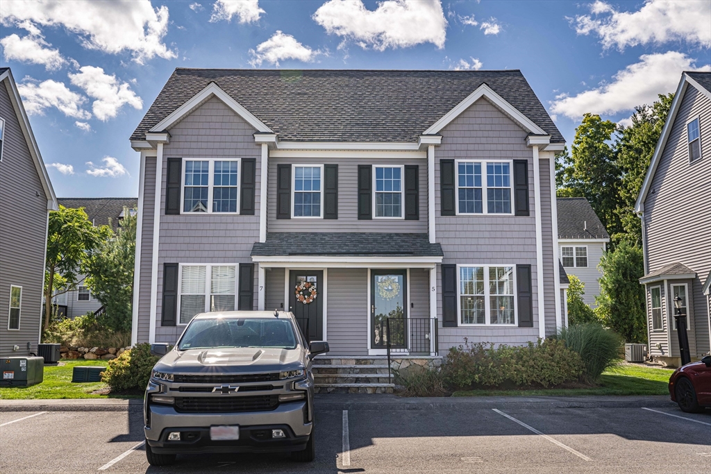 a car parked in front of a house