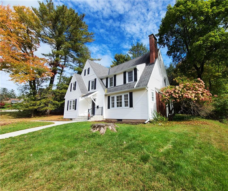 front view of house with a yard