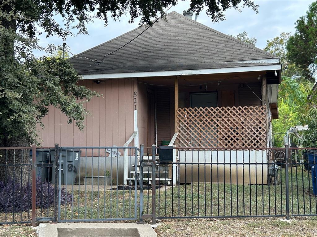 a front view of a house with garage