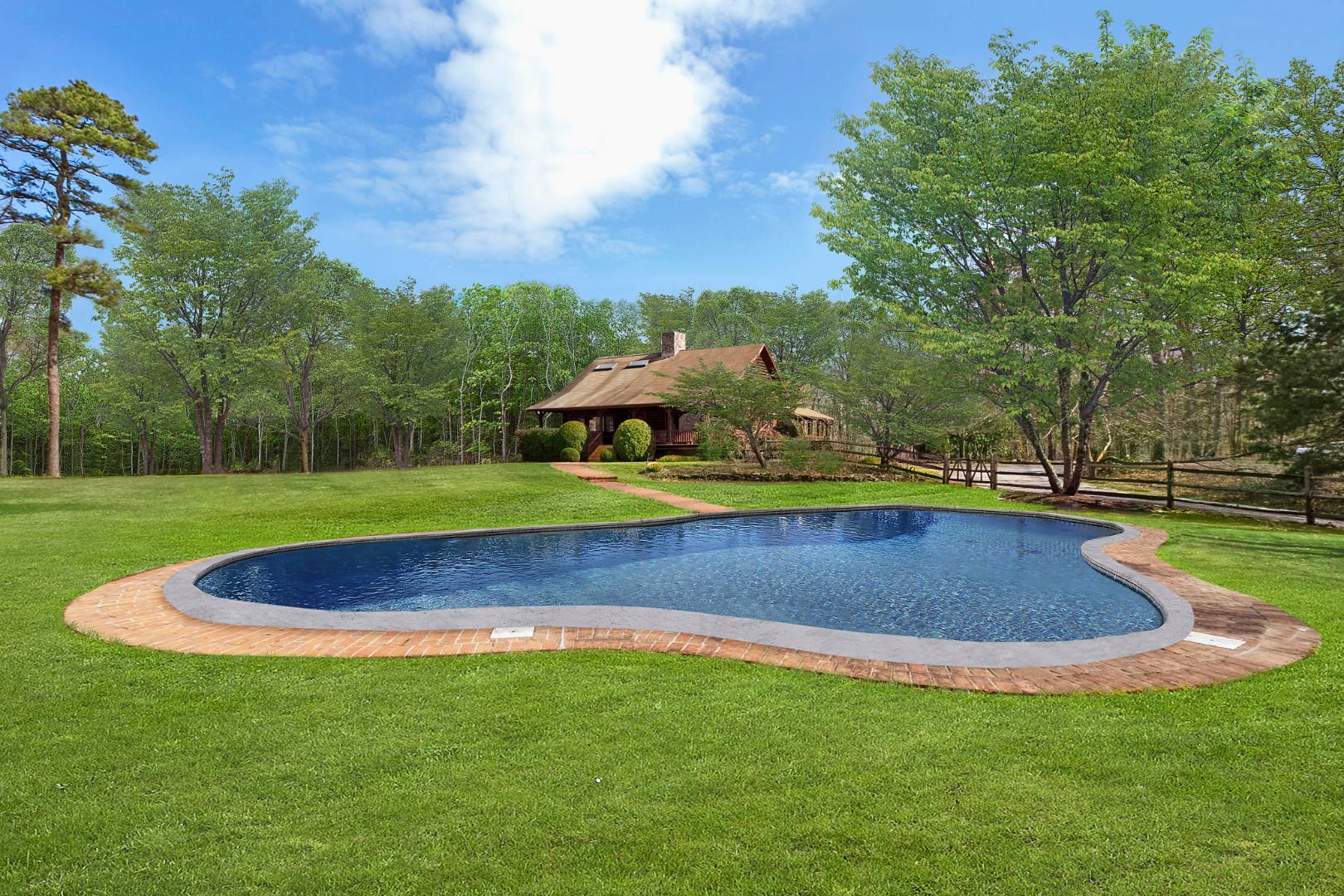 a view of yard with swimming pool and green space