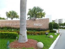 a view of a park with welcome board