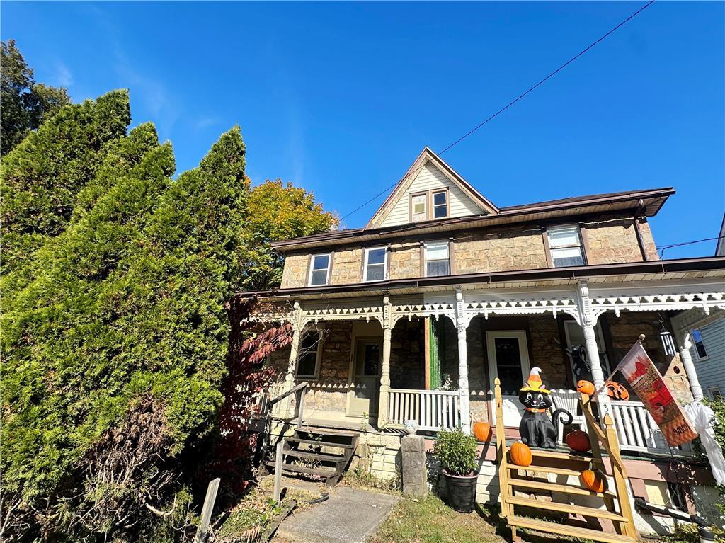 front view of a house with a porch