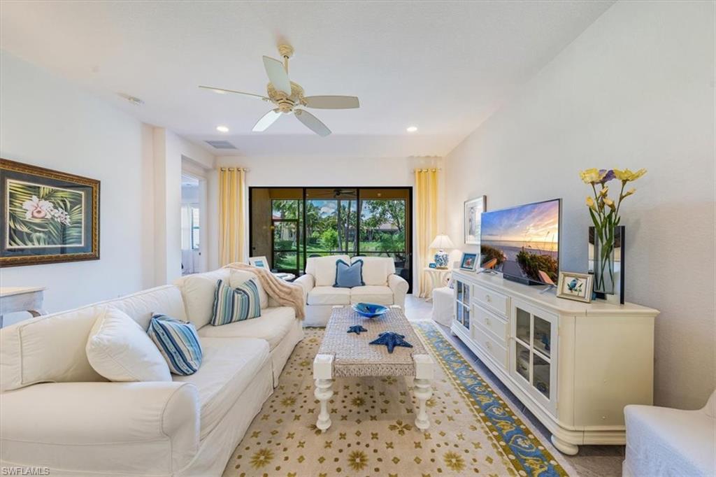 Living room featuring ceiling fan