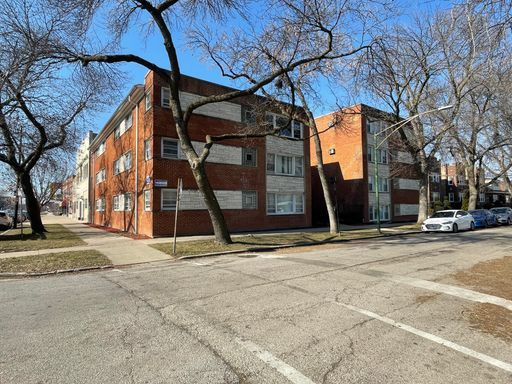 a building with trees in front of it