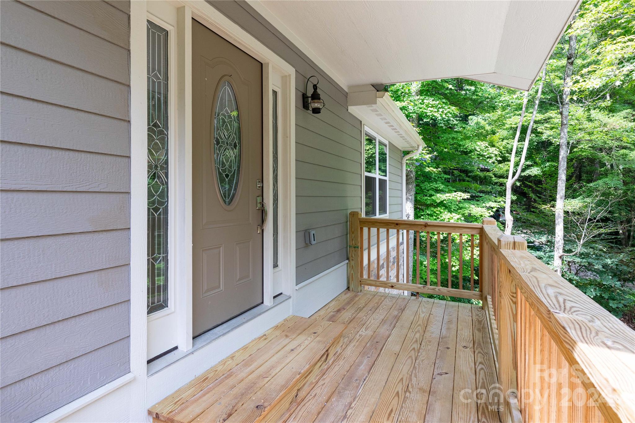 a balcony with wooden floor