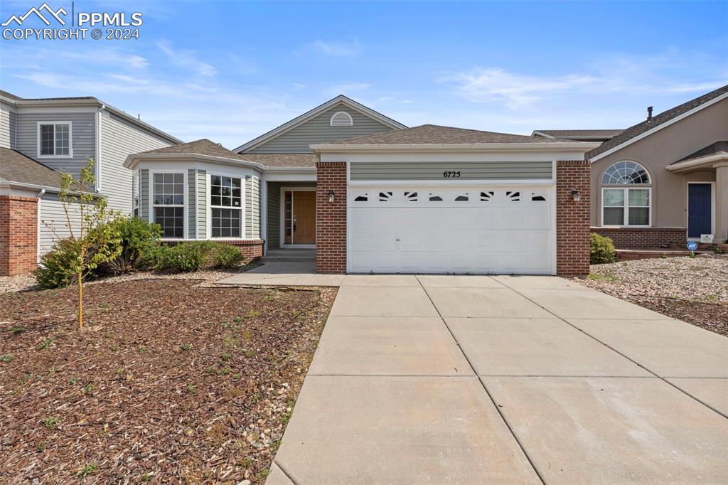 Ranch-style home with a garage