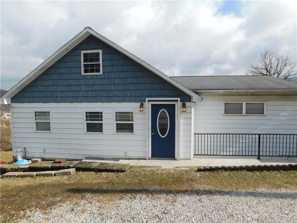 a front view of a house with a garage