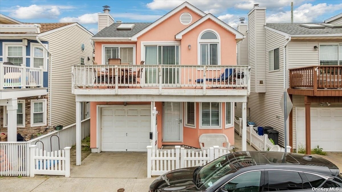 a front view of a house with a porch