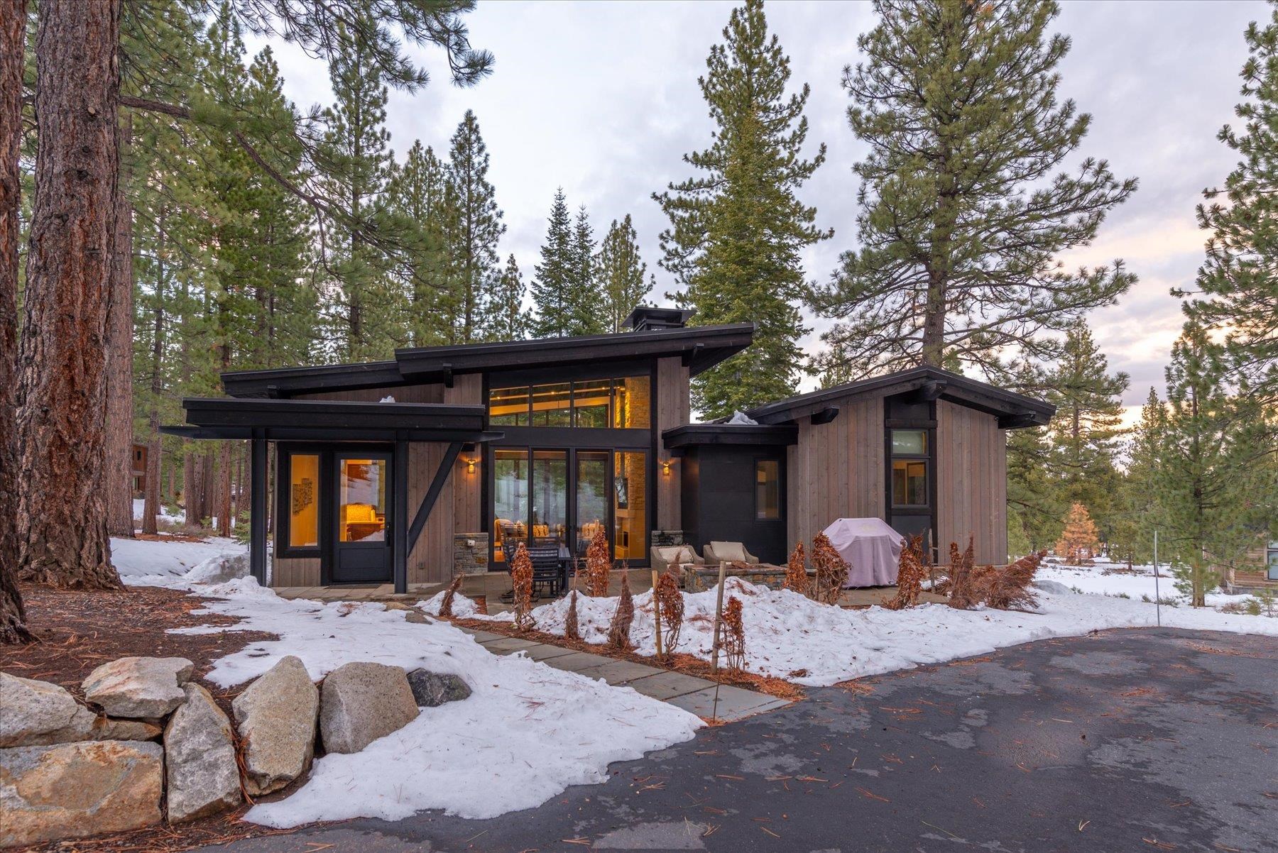 a front view of house with outdoor seating