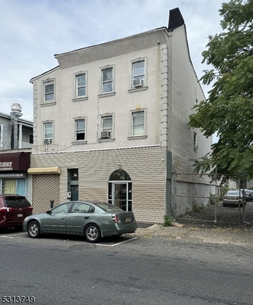 a car parked in front of a house