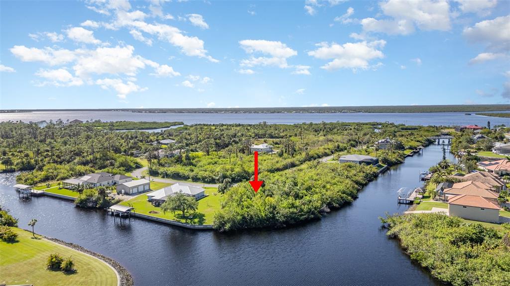 a view of a lake with a house