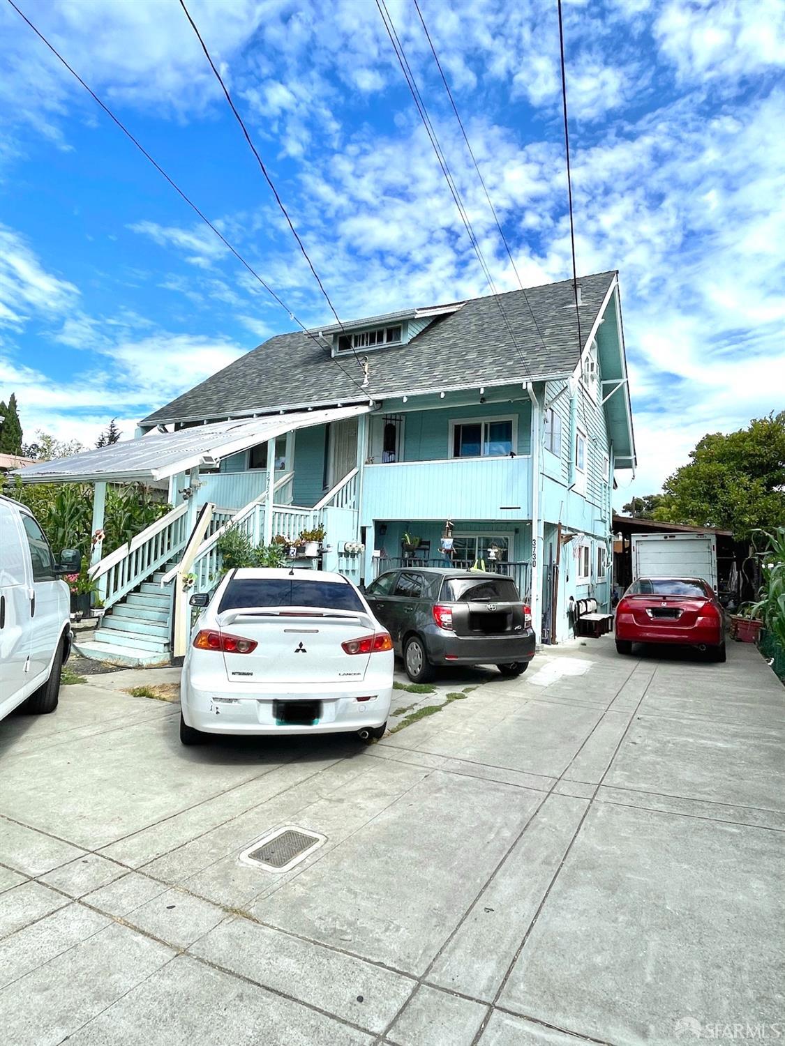 a car parked in front of a house