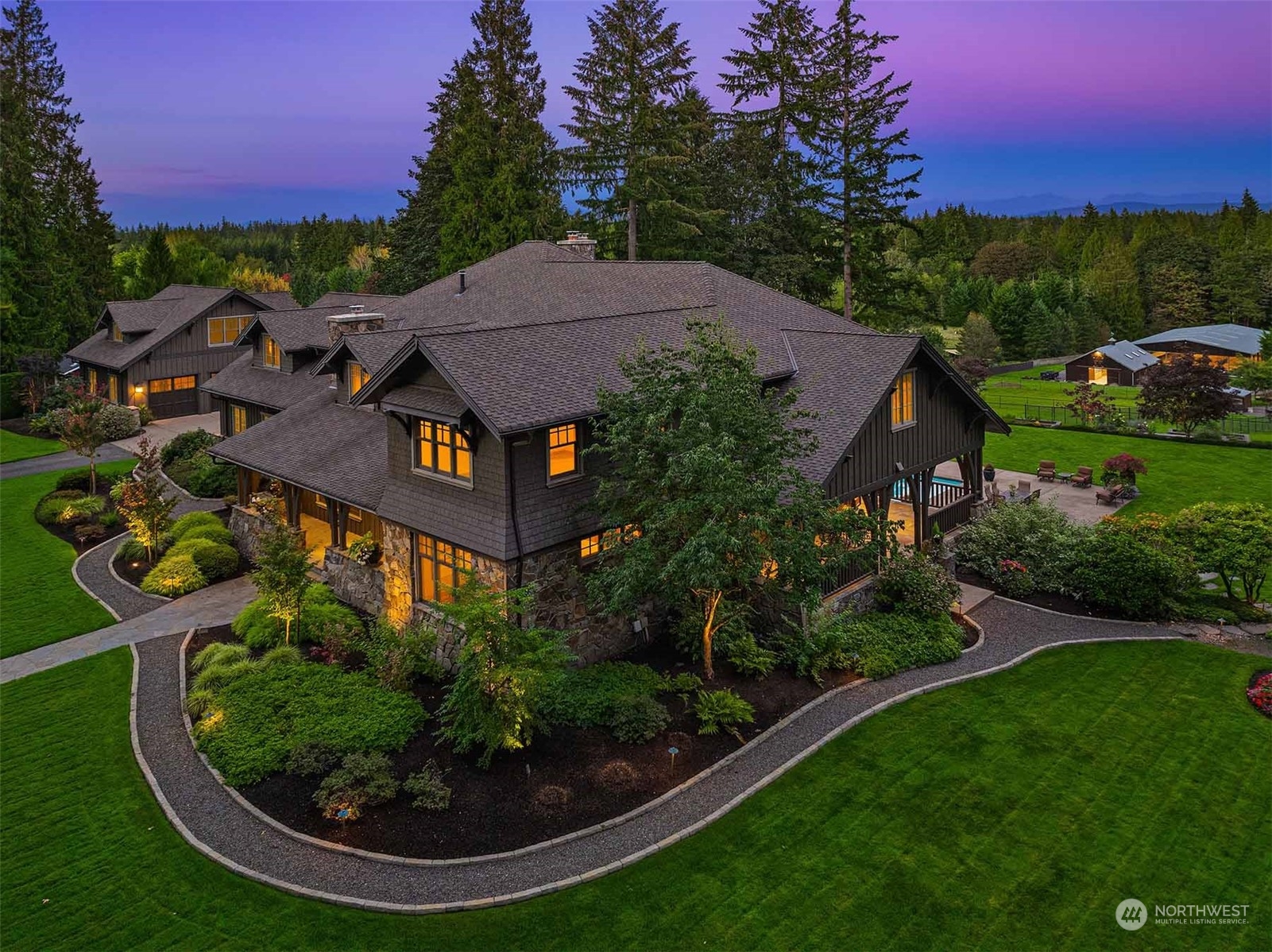 a aerial view of a house with garden space and street view