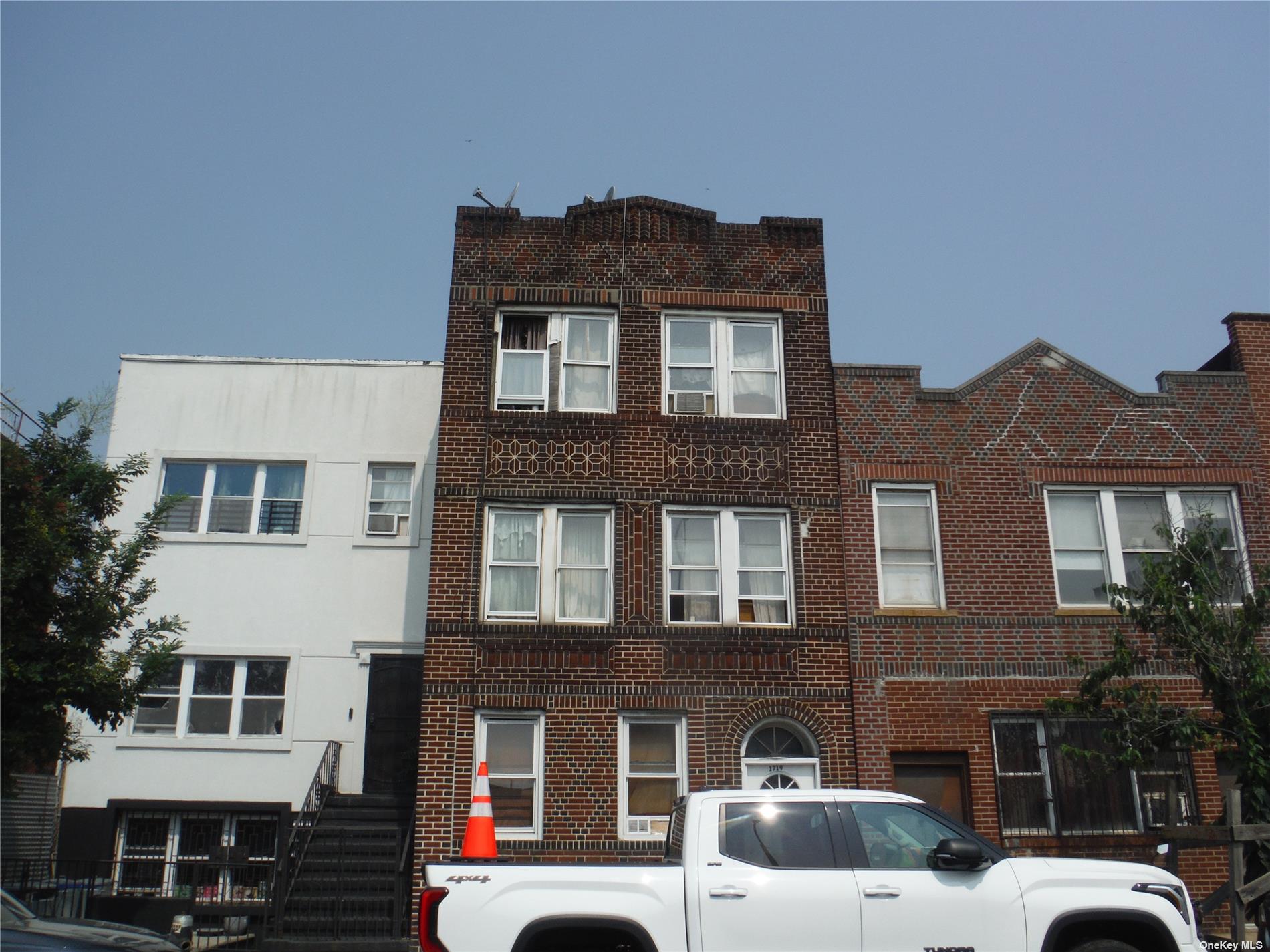 a front view of a house with balcony