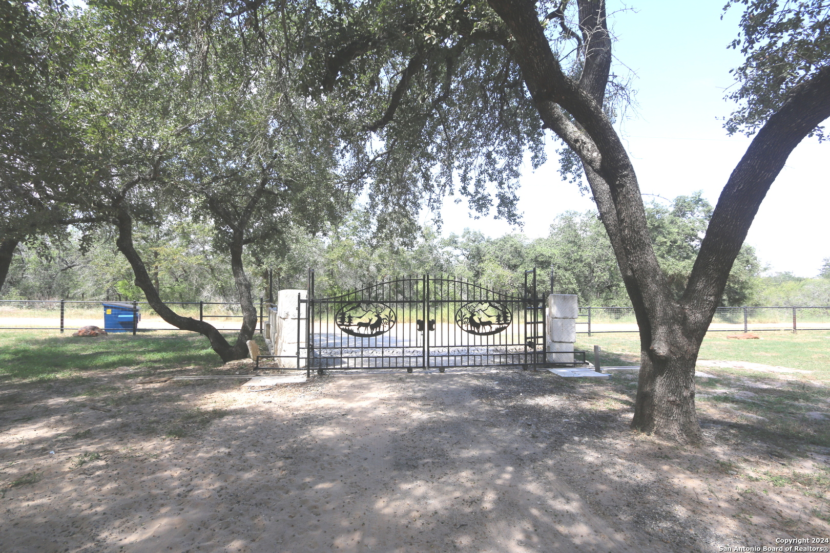 a view of outdoor space with street view and tree