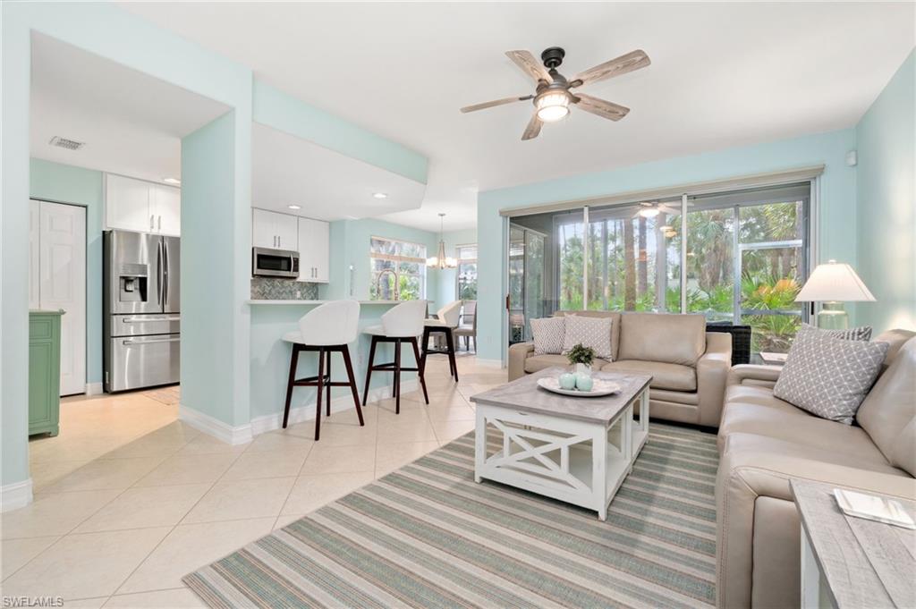 Great room featuring ceiling light/fan and a wealth of natural light