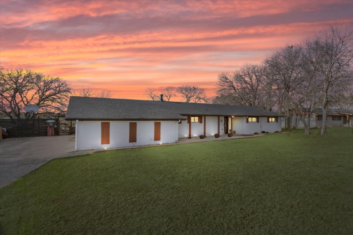 a view of a house with a big yard