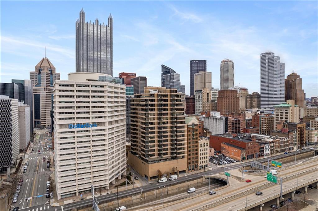 a view of a city with tall buildings