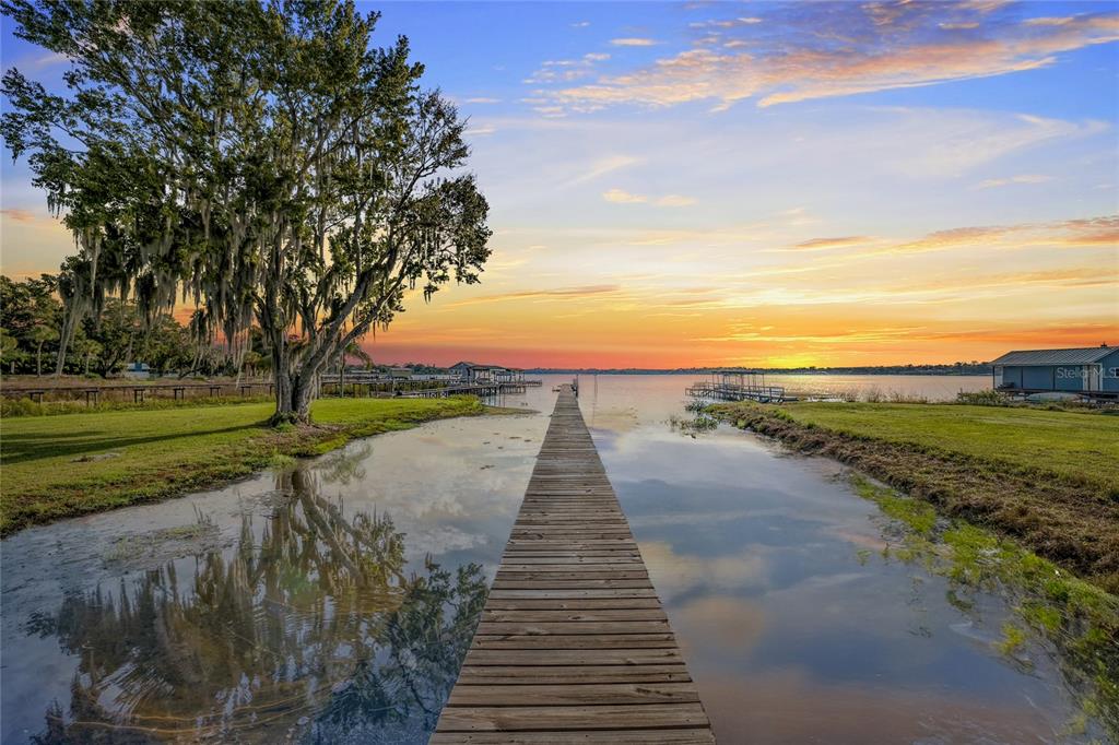 a view of a pathway with a ocean view