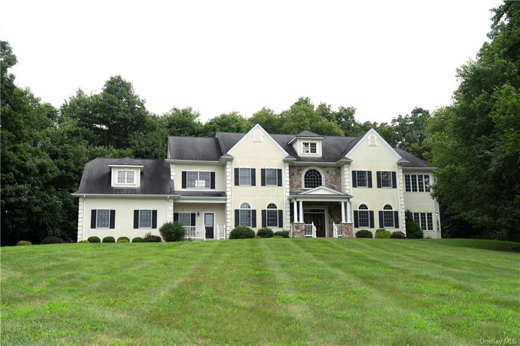 a aerial view of a yard in front of a house