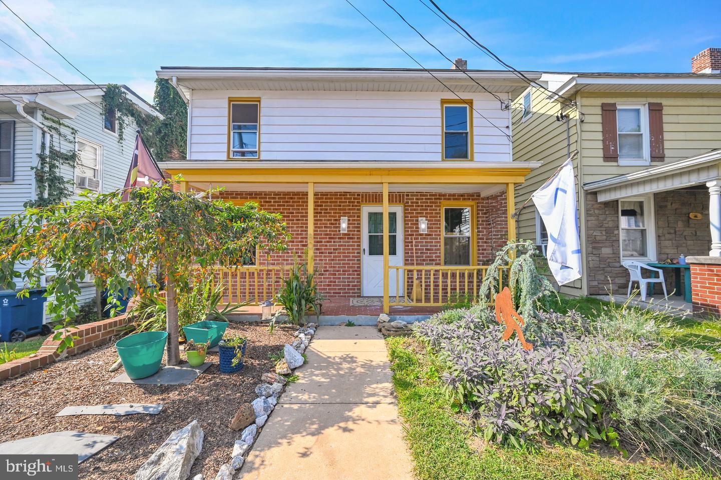 a view of a house with a garden