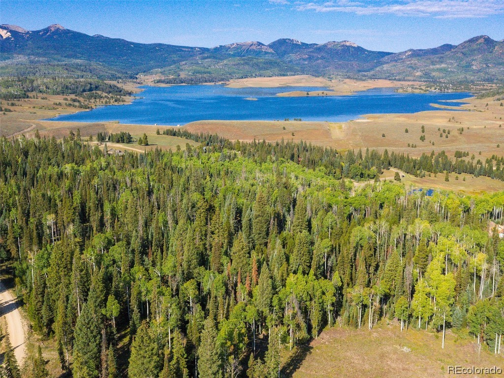 a view of a lake with mountains in the background